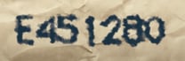印字「E451280」がにじんでもそのまま読み取れる