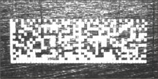 黒樹脂面に印字された2次元コード